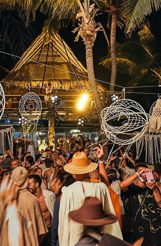 Guests beneath illuminated sculptures in the Soulful Experience portfolio chapter